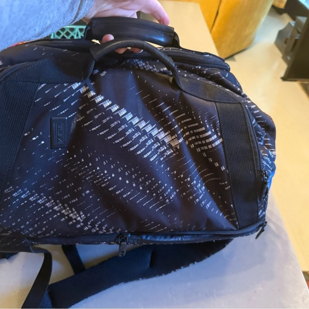 Tumi Black and Gray Patterned Duffel Backpack